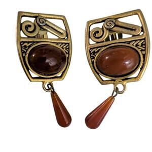 vintage artisan-style clip-on earrings likely from the late 20th century clip on